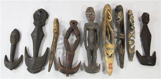 Nine Sepik River tribal food hooks and hook masks, various